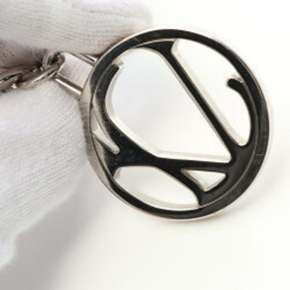 Neo LV Club Bag Charm and Key Holder S00 - Men - Accessories  Louis Vuitton Porte Cls LV Club Keychain Accessory Leather Taiga Black